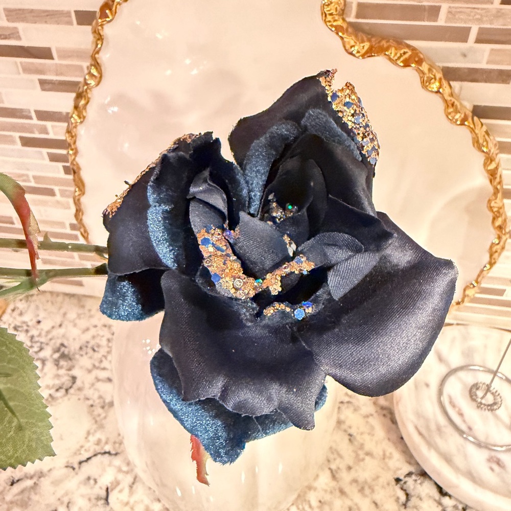 Elegant Black and Gold Decorative Flower